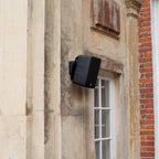 Monitor Audio Climate 50 Outdoor Speakers (Pair) – installed on stone wall